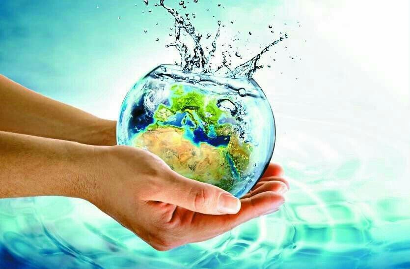 Hands holding a fishbowl filled with water and a globe, symbolizing global water conservation and LeakDtech’s mission to reduce water waste.
