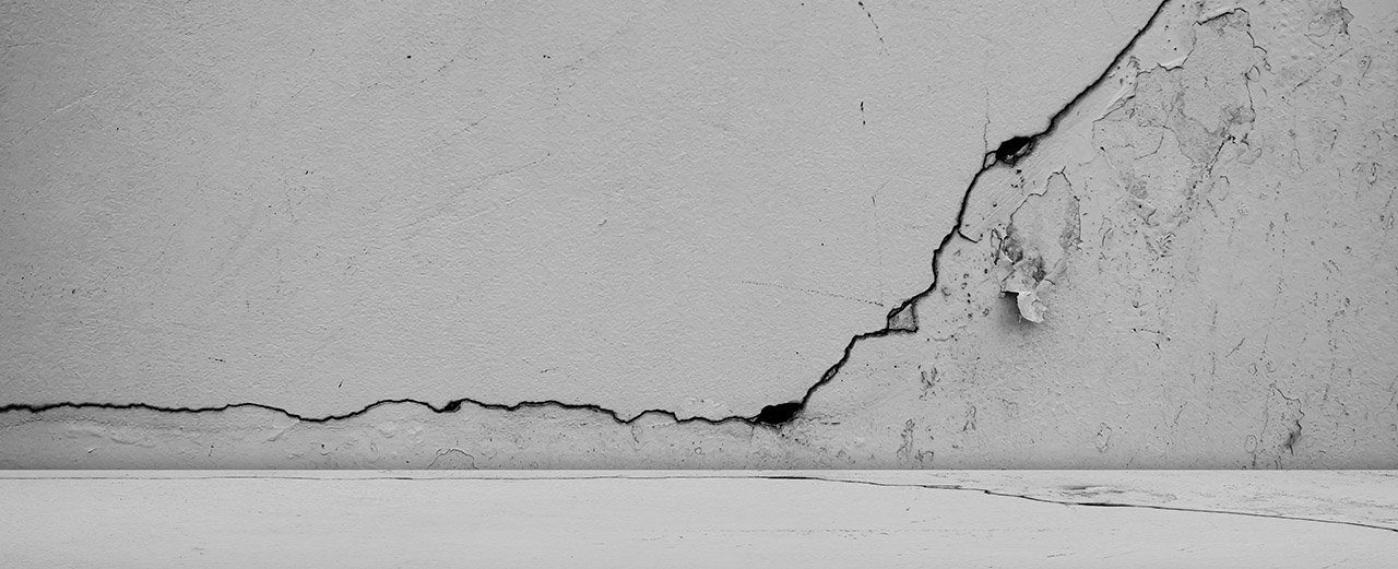 Cracked wall Broken cracked cement wall caused by water leakage in a commercial property in Dubai.