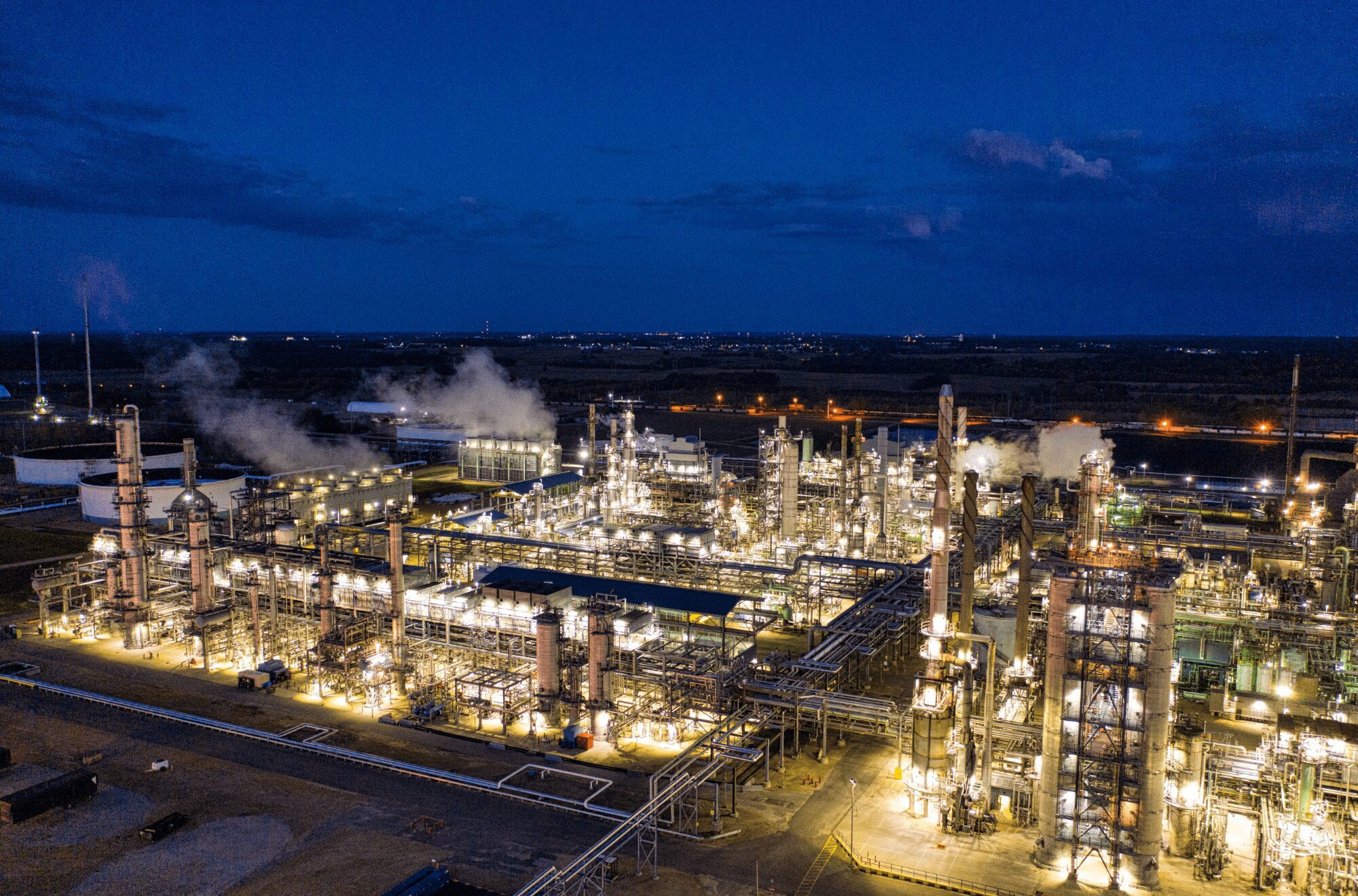 Petrochemical Facility Leak Inspection petrochemical refinery facility at night for industrial inspection