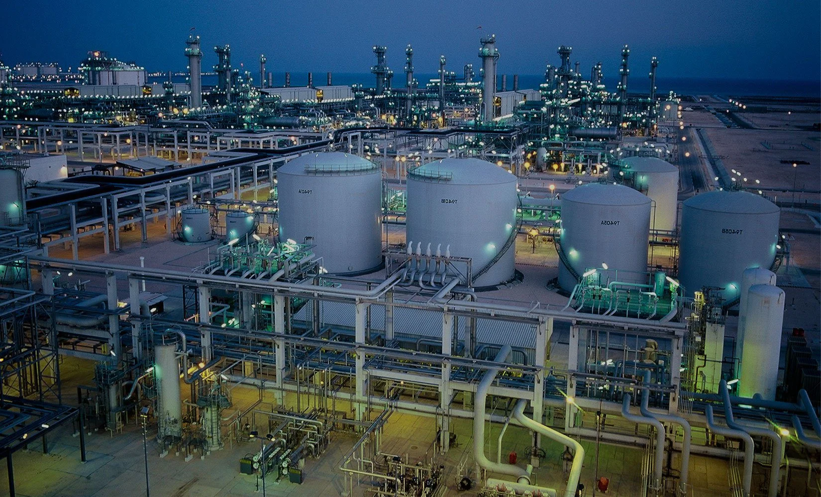 Petrochemical factory in Dubai with large storage tanks and pipelines