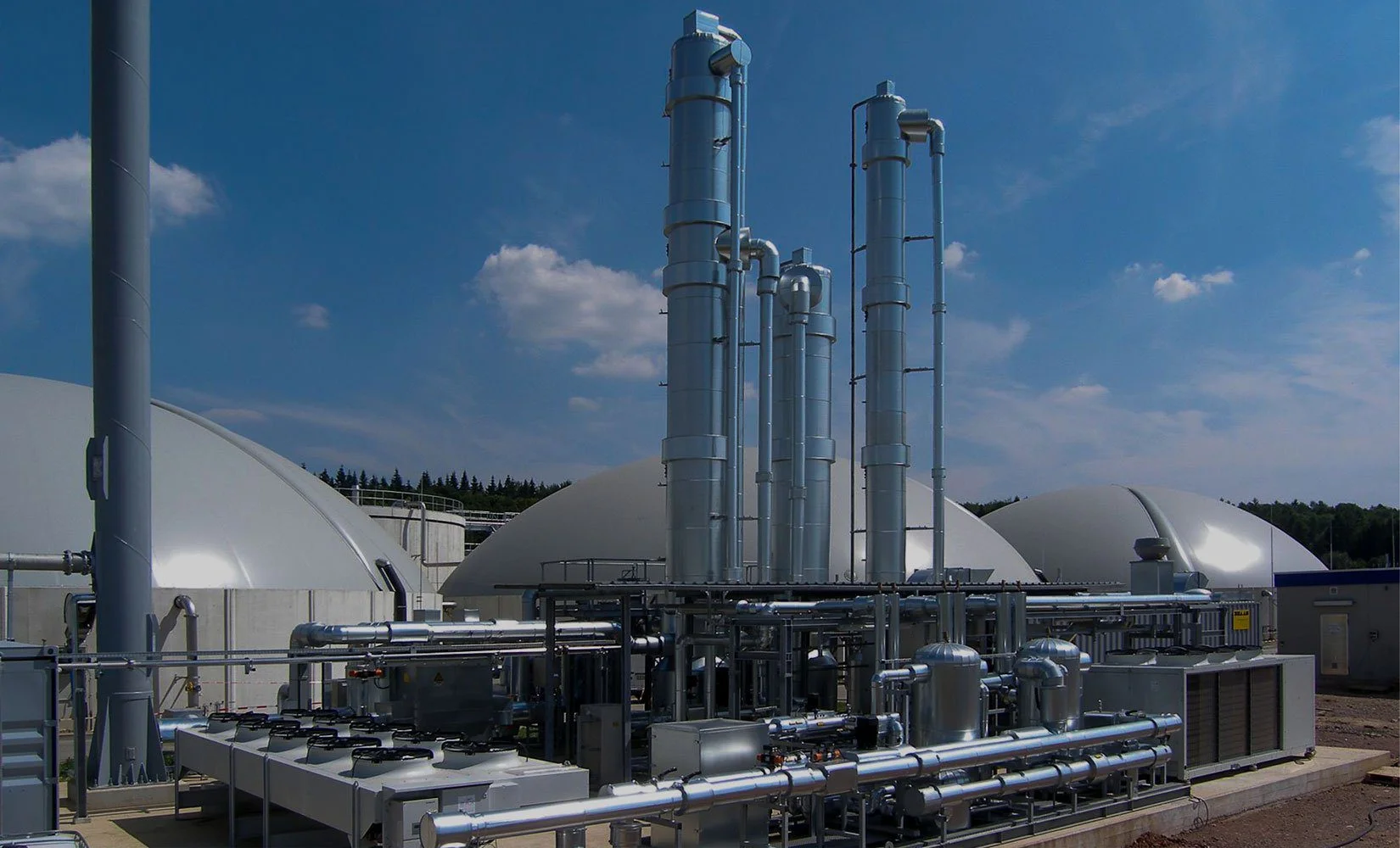 Industrial tanks and piping system at a facility inspected for hidden water leaks in Dubai.